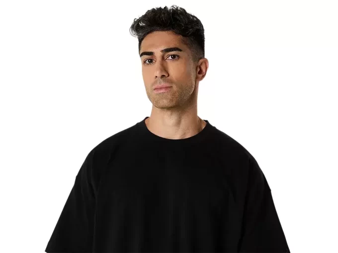 KRAFTIGT AFSLAPPET T-SHIRT MED LOMMER KRAFTIGT AFSLAPPET T-SHIRT MED LOMMER